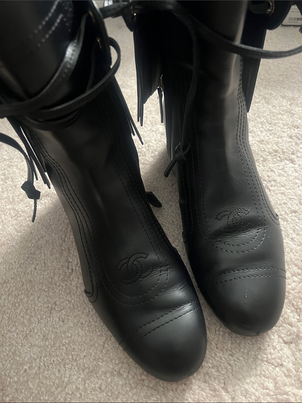 CHANEL Black Leather Heeled Ankle Boots with CC Embossing